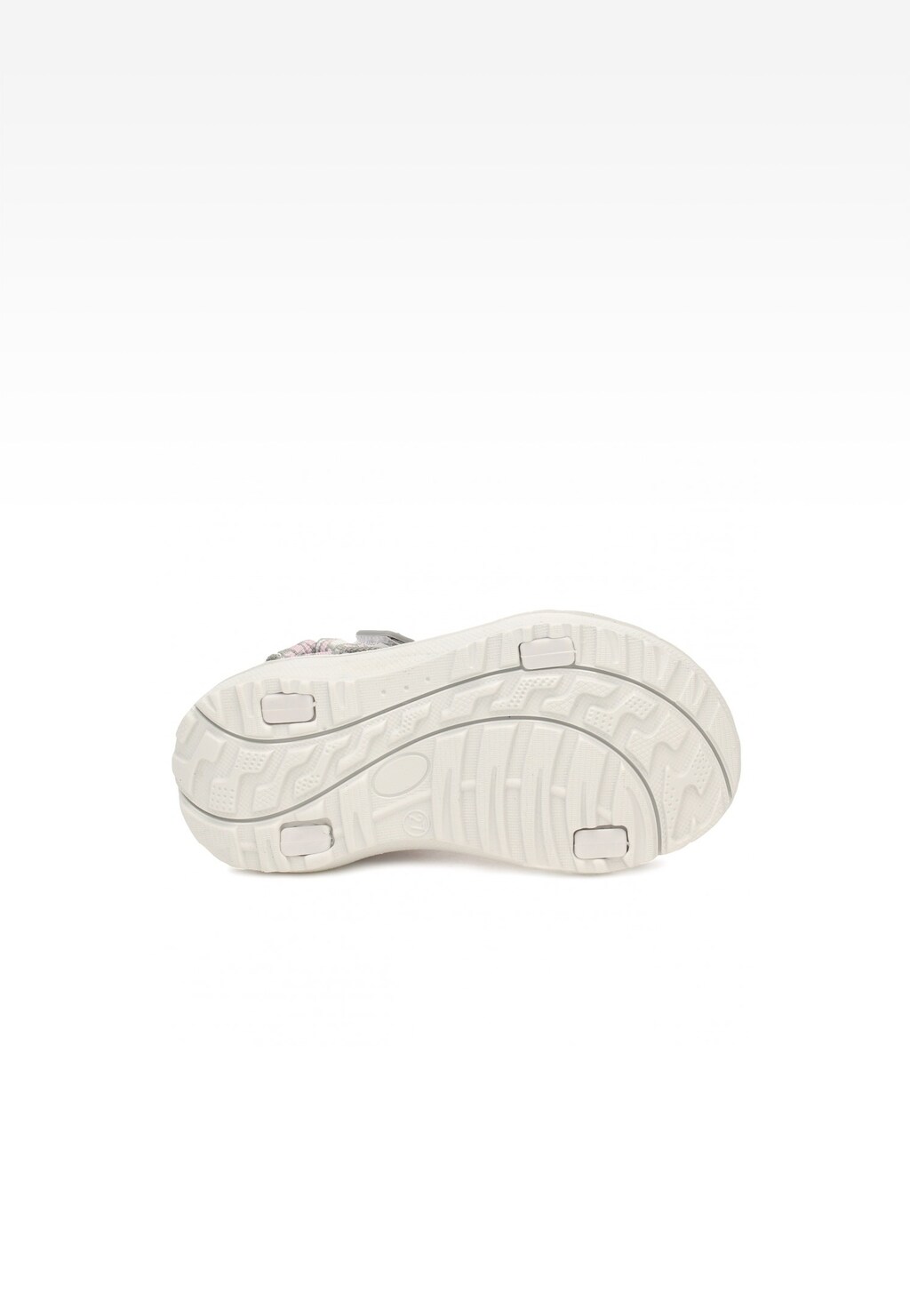 Biała podeszwa sandałów Bartek 16058005 dla dziewcząt, z widocznym wzorem bieżnika zapewniającym przyczepność, widok od spodu obuwia.