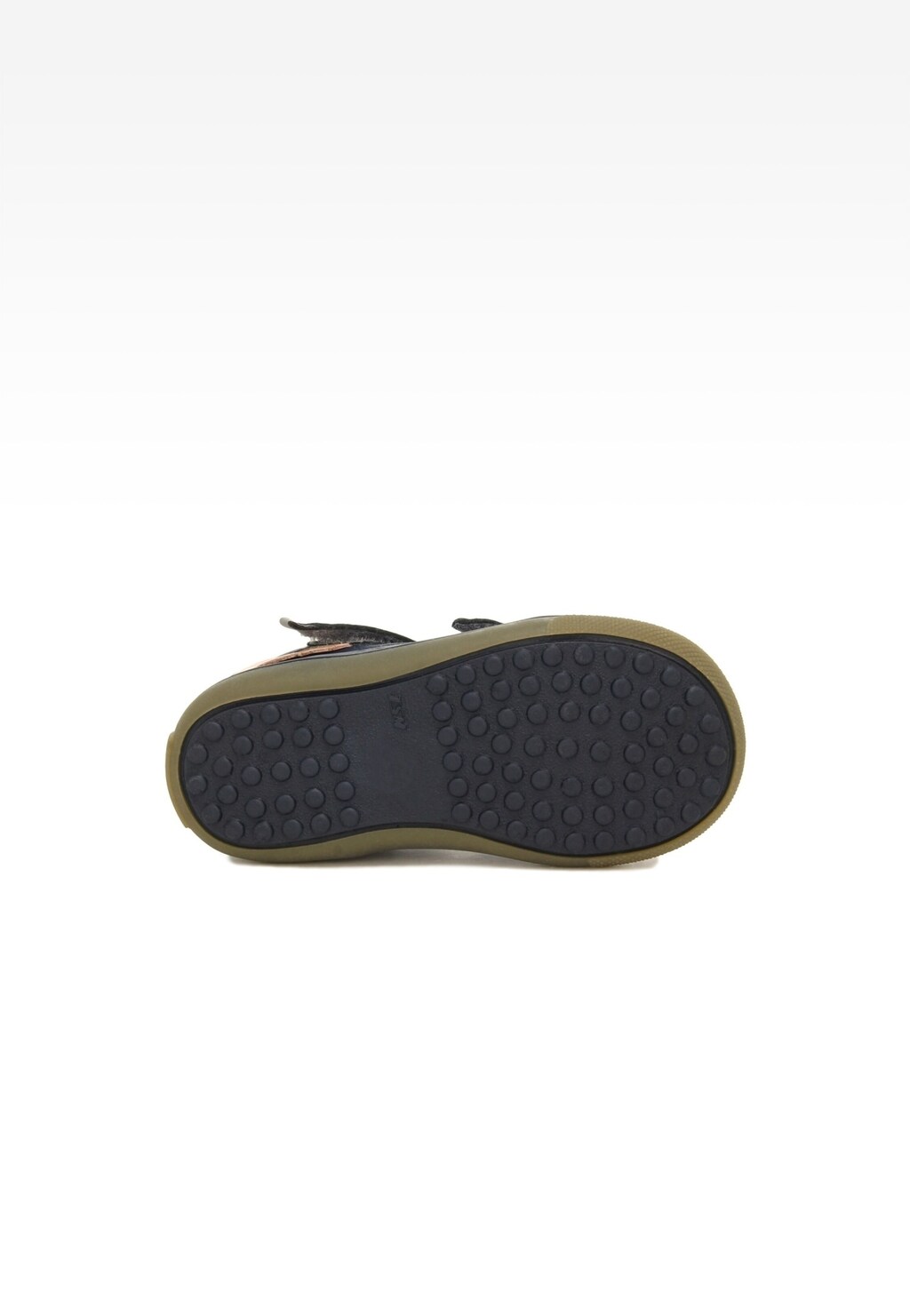 Podeszwa profilaktycznego bucika Bartek 81798-029 dla dziewcząt w kolorze granatowo-złotym, pokazująca antypoślizgowy wzór z charakterystycznymi wypustkami.