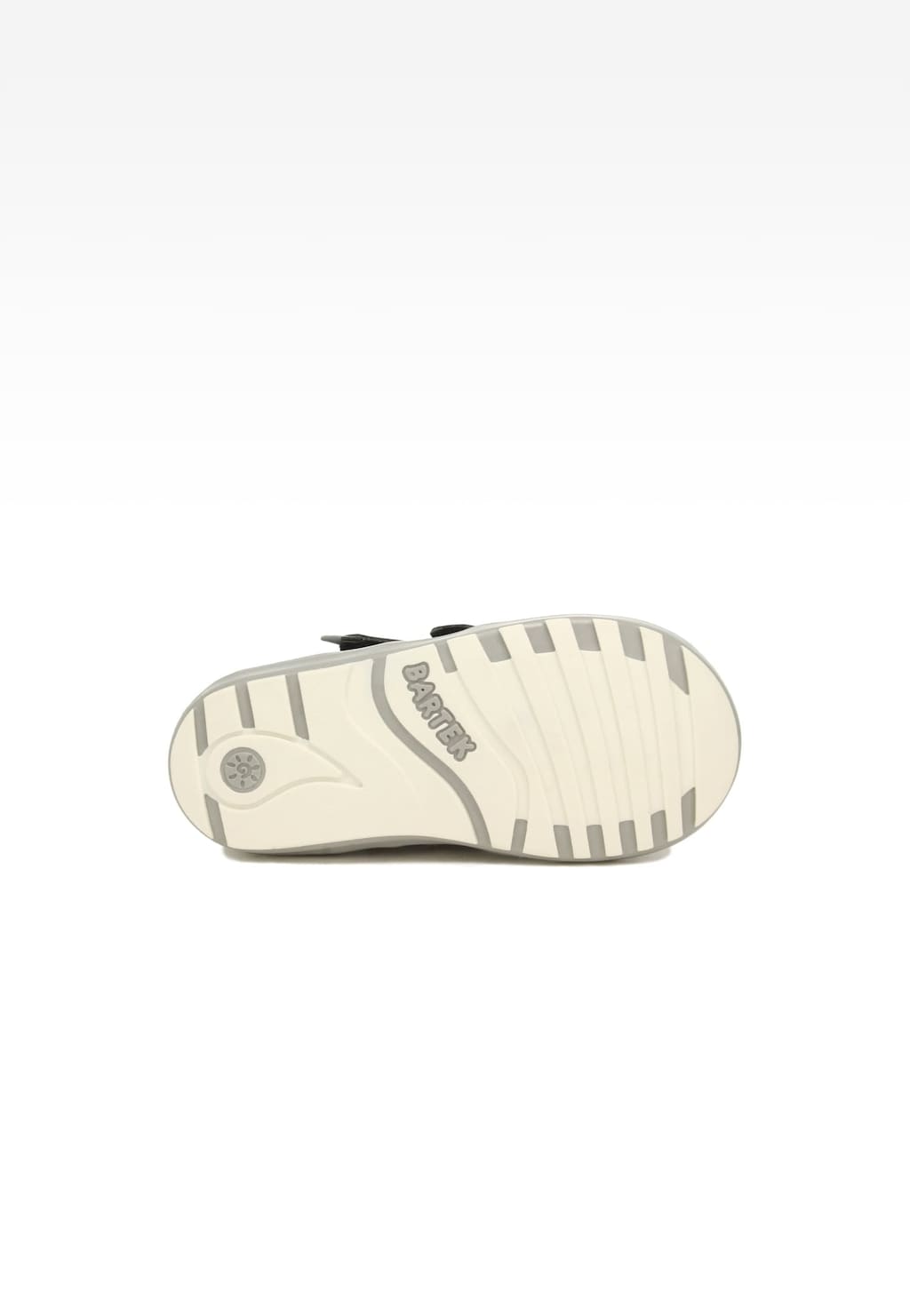 Podeszwa bucika dziecięcego Bartek Mini first steps 11729-021 z widocznym logo marki, wzorem antypoślizgowym i charakterystycznymi żłobieniami dla lepszej przyczepności.