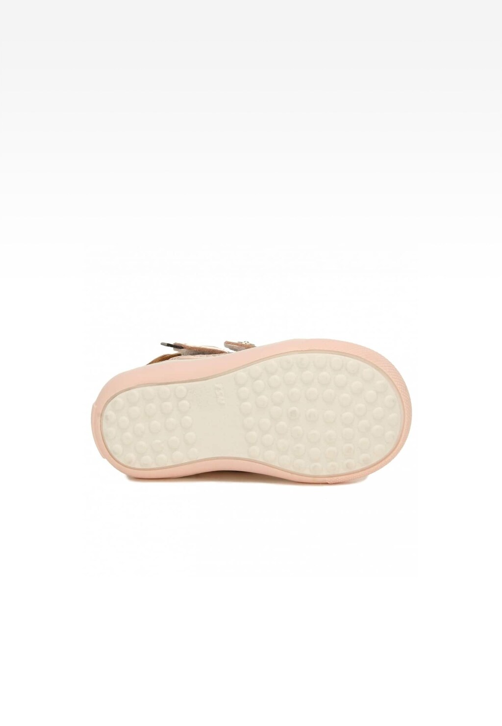 Podeszwa trzewików BARTEK 11702-032 dla dziewcząt w kolorze beżowo-złotym, widok od spodu pokazujący antypoślizgowy wzór punktowy na białej powierzchni.