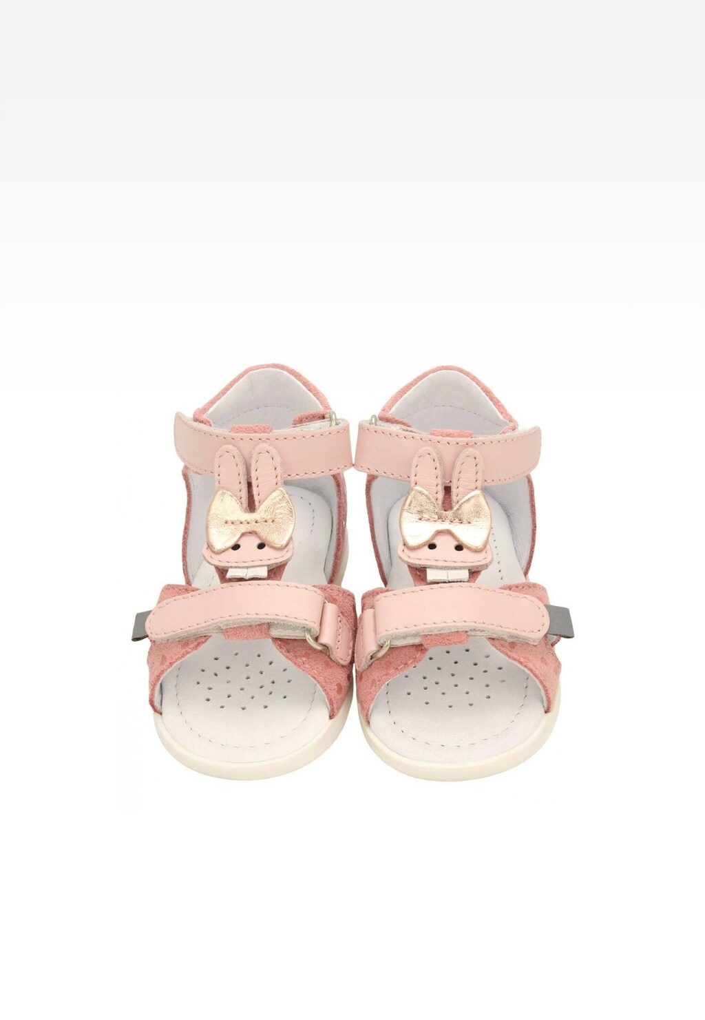 Jasnoróżowe sandały Bartek 11414007 dla dziewcząt z ozdobną kokardką, zapinane na rzepy, widok z góry. Dziecięce obuwie letnie o białej wyściółce.