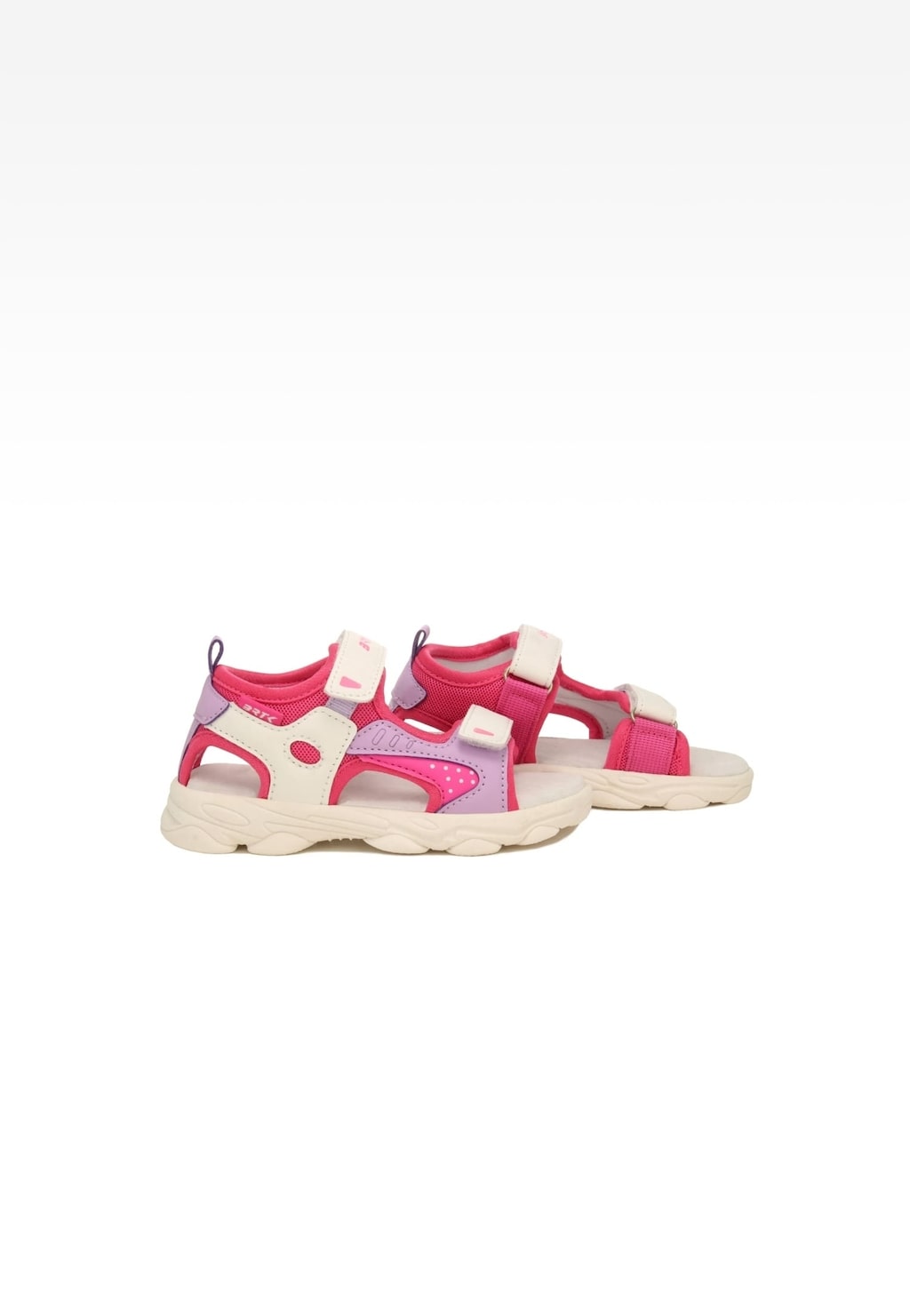 Dziewczęce sandały Bartek 19077003 w różowo-białym kolorze z rzepami, widoczne z boku. Lekka podeszwa i zapięcia na rzepy zapewniają wygodę i łatwość zakładania.