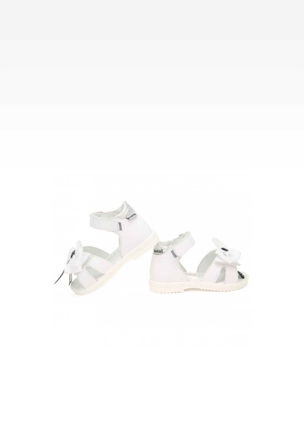 Białe sandały Bartek 11534002 dla dziewcząt z ozdobną kokardką, zapinane na rzepy, widok z boku, doskonałe na lato.
