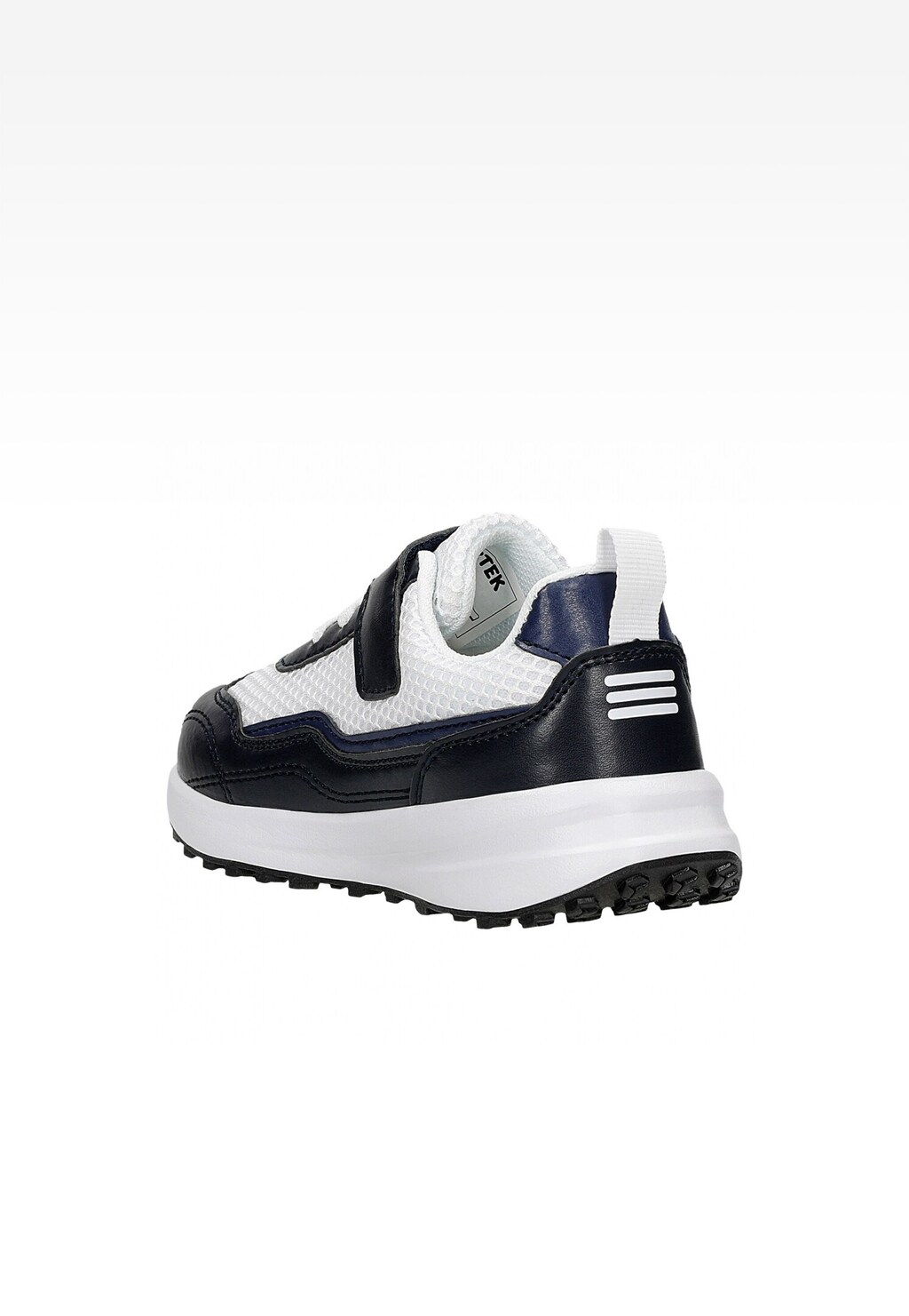 Granatowo-białe półbuty dziecięce BARTEK 11042402 z rzepem, pokazane z boku. Widoczna charakterystyczna podeszwa i logo marki na zapięciu.