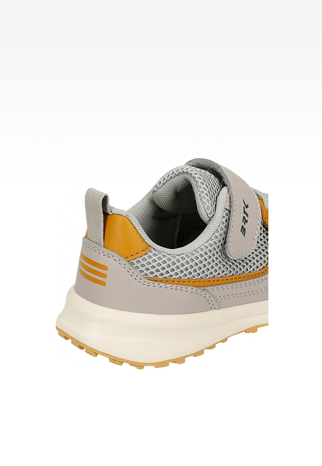 Półbuty dziecięce BARTEK 18042401 w kolorze beżowo-szarym z żółtymi akcentami, widok z tyłu ukazujący rzep, siatkową cholewkę i grubą, jasną podeszwę.