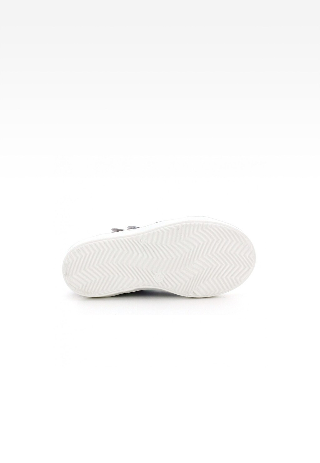 Podeszwa trzewików dziecięcych Bartek T-87364/1GK dla dziewczynki z charakterystycznym zygzakowatym wzorem, w kolorze białym, widok od spodu.