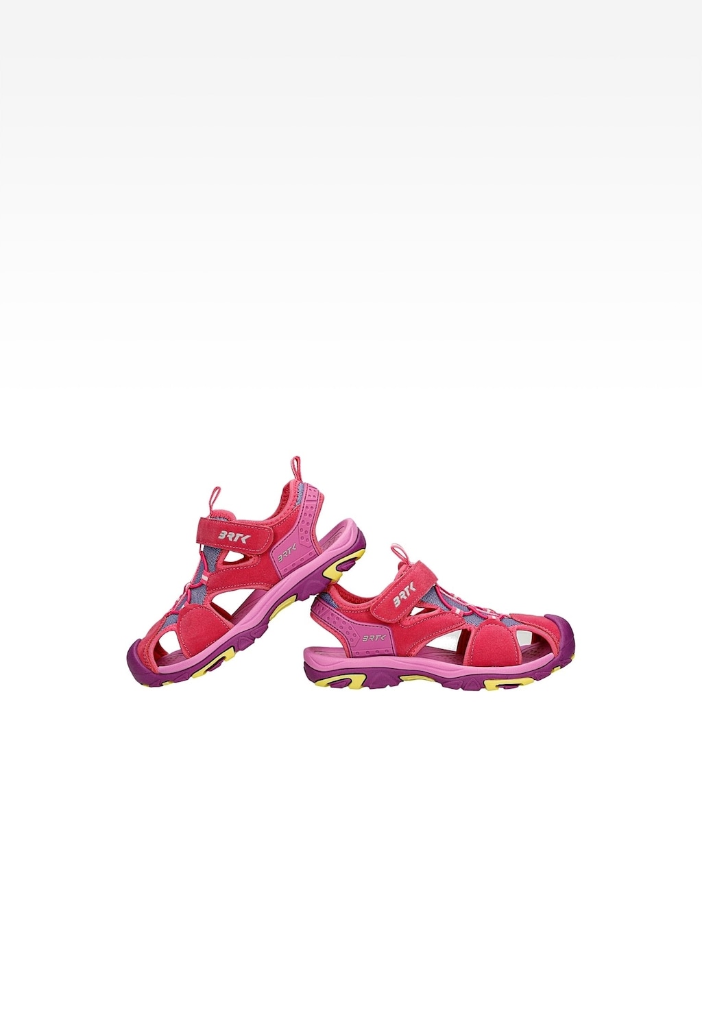 Różowe sandały dziewczęce Bartek 19042502 z zapięciem na rzepy, ukazane z boku. Kolorowa podeszwa w odcieniach fioletu i żółci, wygodne wycięcia zapewniające przewiewność.