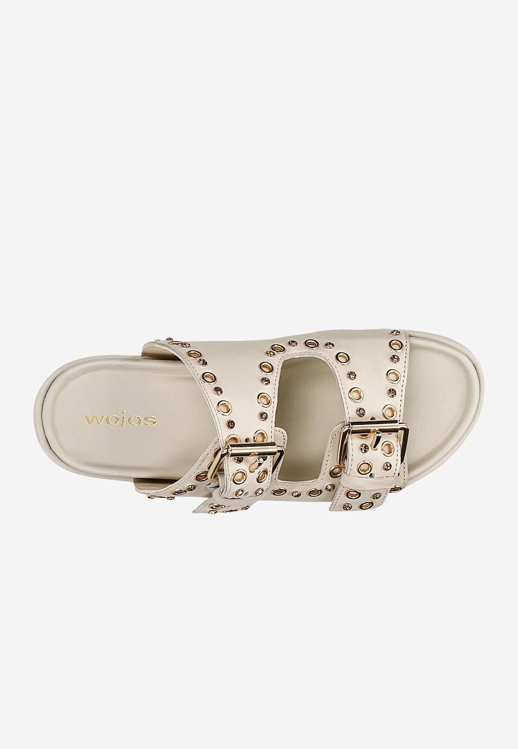 Płaskie skórzane klapki Wojas 74125-54 w beżowym kolorze z ozdobnymi złotymi nitami i klamrami, widok z góry. Eleganckie obuwie damskie na lato.