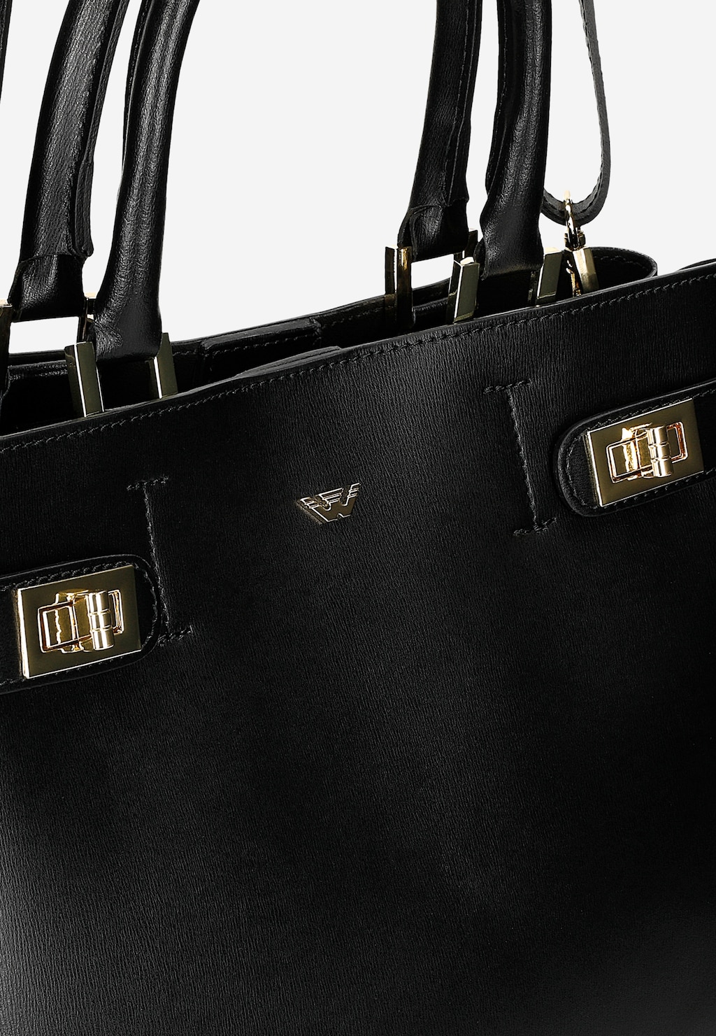 Elegancki czarny skórzany kuferek damski Wojas model 80403-51 z złotymi detalami, zapięciami i logo. Widok z góry ukazujący uchwyty i górną część torebki.