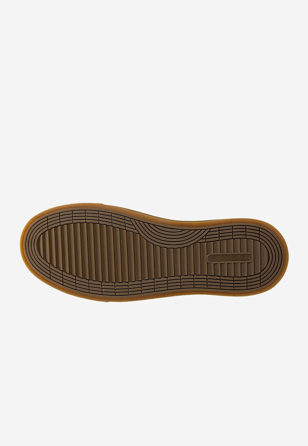 Brązowa podeszwa butów Wojas model 10228-52 z charakterystycznym wzorem bieżnika, widoczna od spodu. Kauczukowa, miodowa obwódka otacza podeszwę trampek męskich.