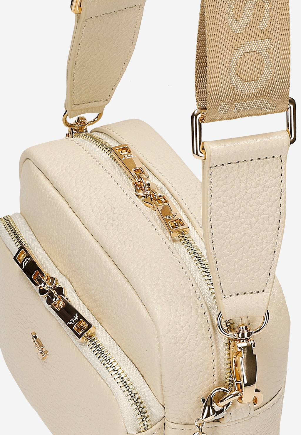 Mała beżowa torebka Wojas model 80314-54 ze skóry naturalnej z ozdobnymi złotymi zamkami, widocznym paskiem na ramię i funkcją crossbody bag.