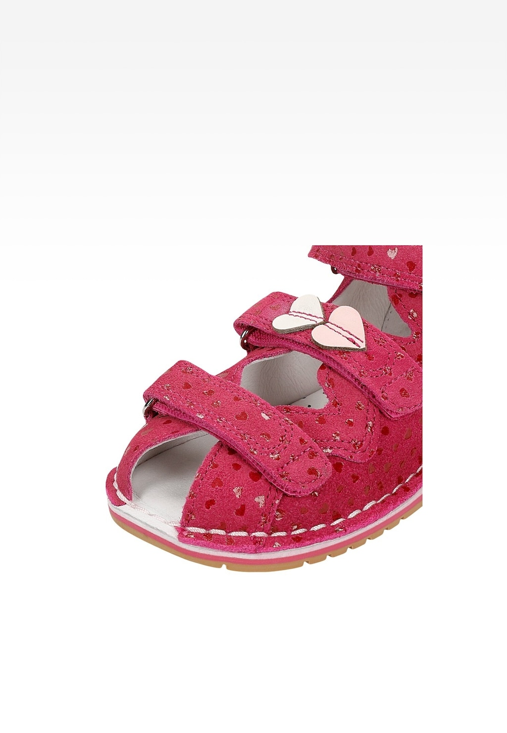 Różowe sandały zabudowane BARTEK model 8550065 dla dziewczynki, z ażurowymi wycięciami w kształcie serduszek i ozdobnym sercem na pasku, zapinane na rzepy.