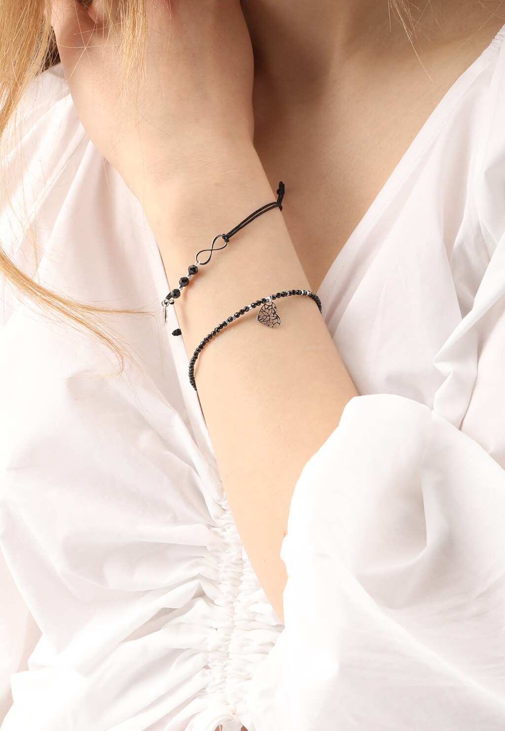 Bransoletka damska z elementami srebra i symbolem nieskończoności 98910-81 Widok 1