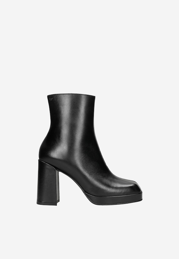 Women's black ankle boots on solid heel