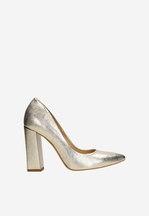 Gold pumps with a high block heel