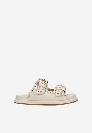 Płaskie skórzane klapki w kolorze beżowym ze złotymi nitami