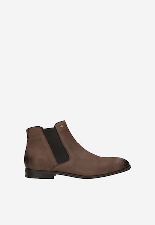 Brown Chelsea boots with black elastic and distressed look