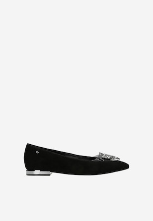 Black ballet flats with silver accents and heart-shaped embellishment