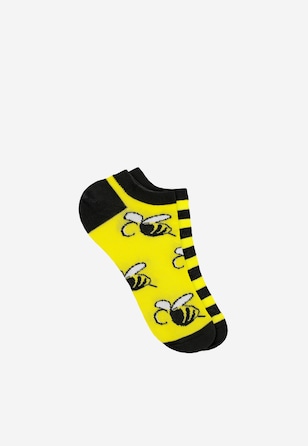 Żółto-czarne stopki w pszczoły