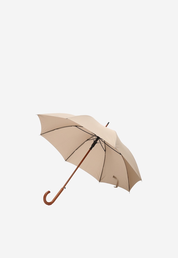Duży beżowy parasol z drewnianą rączką
